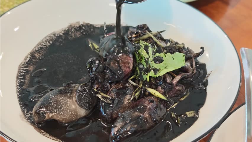 Squid stir-fried in black sauce, a popular Thai dish