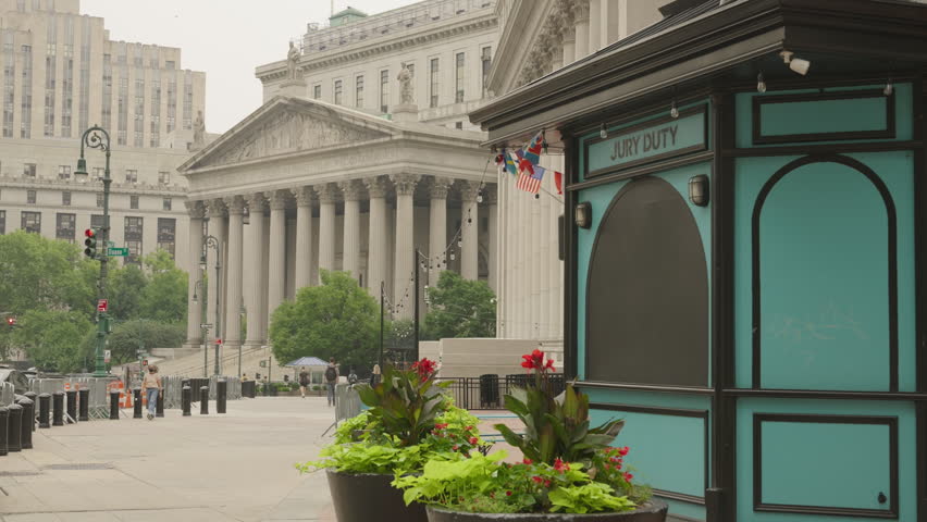 Static Shot of New York County Court House In NYC with Jury Duty Structure People Walking by