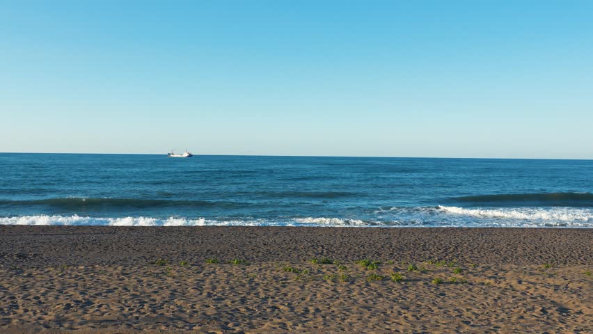 Sea waves hitting the shore