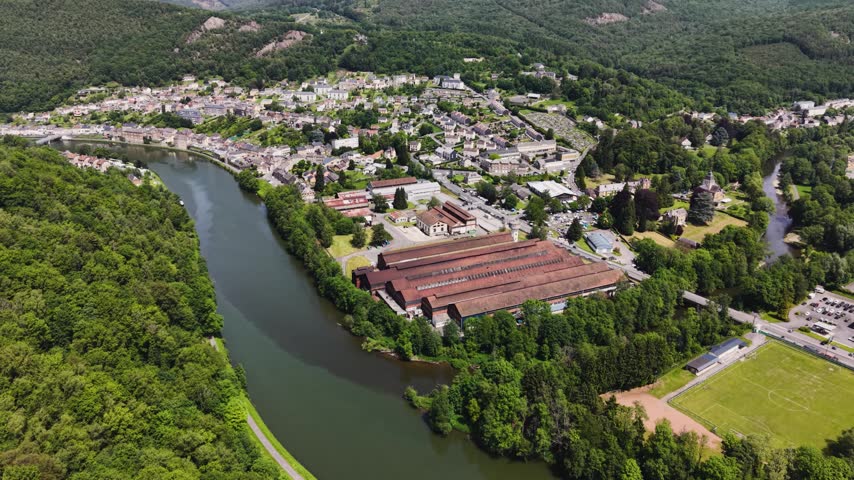 Aerial view around the downtown of Montherme in France on a sunny summer noon