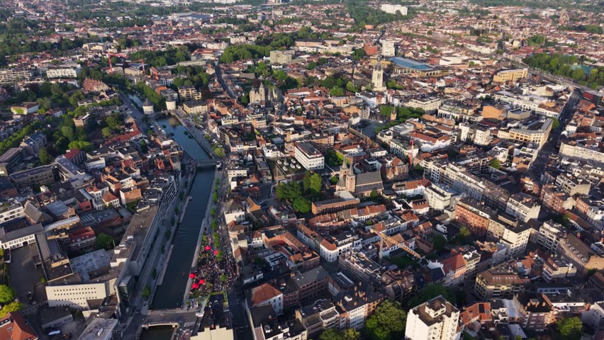 Aerial view around the downtown of Kortrijk in Belgium on a sunny summer afternoon