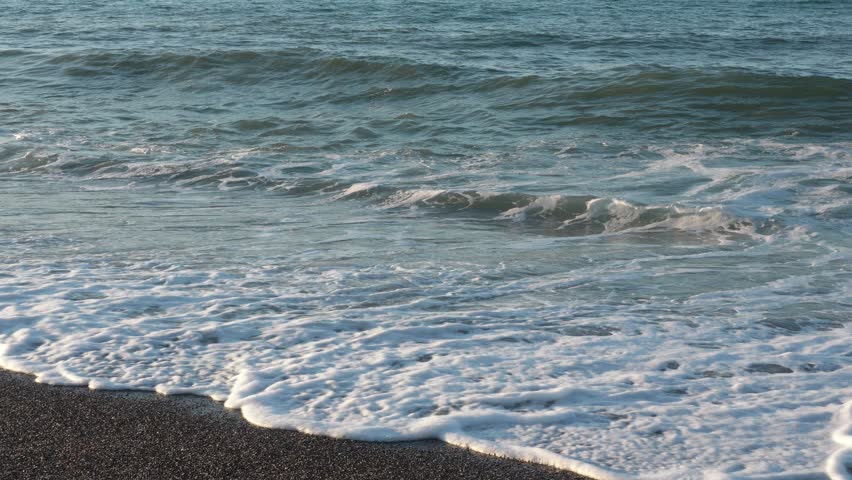 Sea waves hitting the shore
