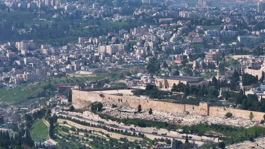 Panoramic aerial shot showing Al Aqsa Mosque Dome of the Rock and the ancient Southern Wall of the Temple Mount in Jerusalem
