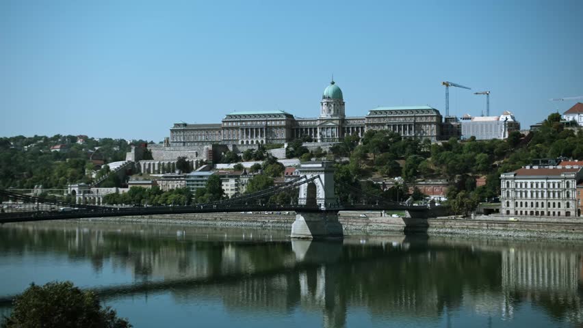 Exterior view of the famous Szechenyi Chain Bridge across Danube River with Buda Castle in Budapest Hungary