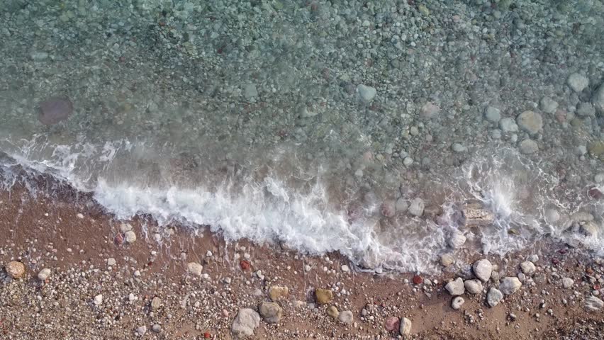Croatia Pebble Sandy Beach Shoreline Waves Close Up