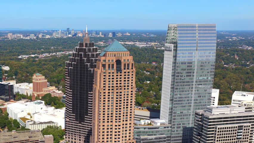 Aerial view of downtown Atlanta city landscape with skyscraper buildings. Urban growth, transportation infrastructure and modern American metropolis.