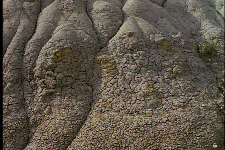  Tilt up weird eroded rock formation to butte in Medora, North Dakota.