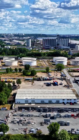 Industrial buildings at Port of Bordeaux, France, with storage tanks and facilities.