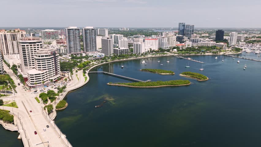 Aerial panorama of West Palm Beach waterfront with islands and marina along Flagler Drive and South Cove Islands