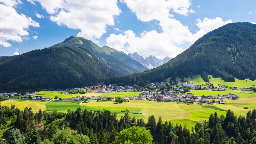 Time lapse of Typical Alps village in Tyrol near Innsbruck in Austria at sunrise.