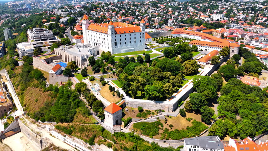 Fight around the stunning territory of Bratislava Castle in Slovakia. Drone footage over the famous landmark on sunny day.