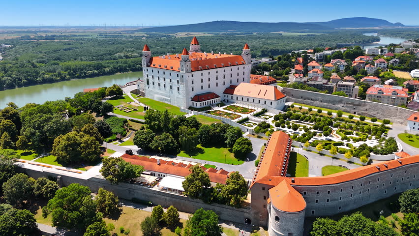 Beautiful well-kept territory of Bratislava Castle. Stunning old historical buildings surrounded by the gorgeous garden. Aerial perspective.