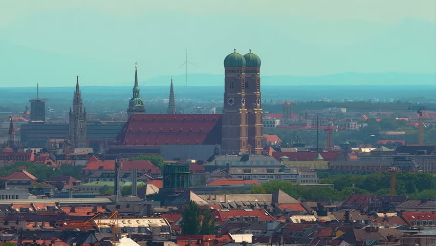 Munich city skyline aerial view featuring the iconic Frauenkirche, St. Peter