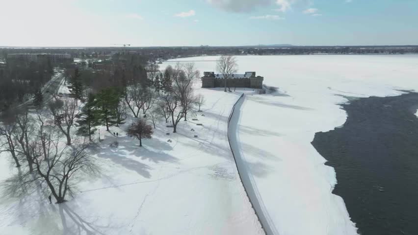 drone approaching from the back to castle fort chambly in quebec canada n going around next to river richelieau