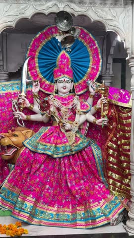 Video of an handmade colorful idol of Goddess Durga at temple to worship.