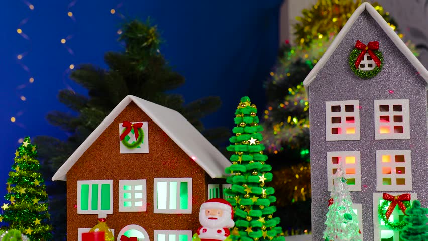 Against the backdrop of a Christmas village, a yellow car quickly drives up to the snowman