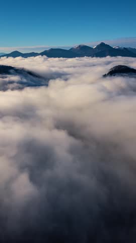 Foggy Mountain Landscape Above the Clouds, Vertical View of Misty Nature 