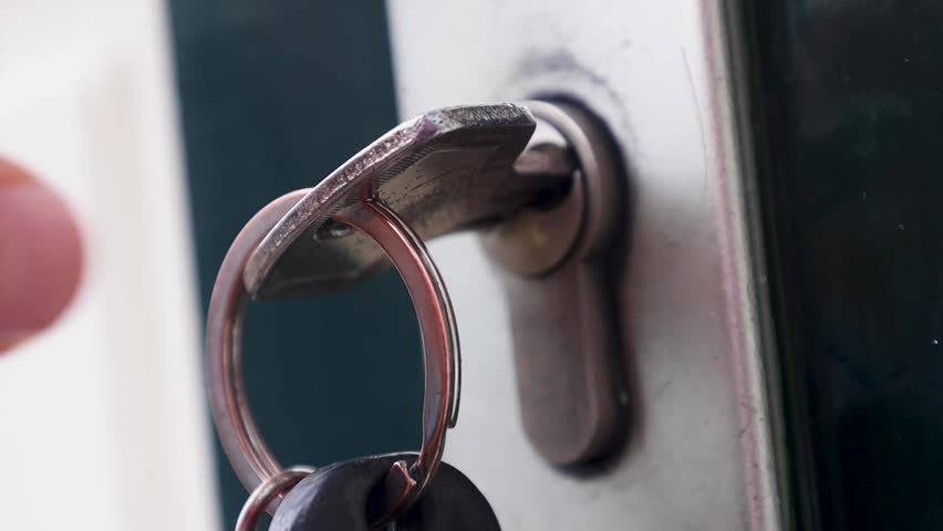 Video turning key around inside door lock.