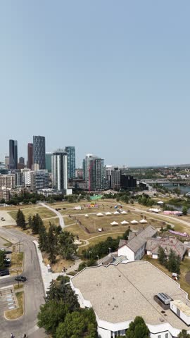 Aerial view of Calgary downtown skyline with modern skyscrapers, urban landscape and river in Alberta, Canada.