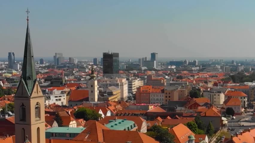 Aerial View of Bratislava Old Town, St Martins Cathedral Tower and Orange Residential Population Rooftops Slovakia