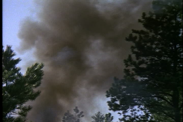 Historical reenactment in Hill City, South Dakota. Dark black smoke plume from steam train.