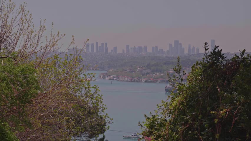 Panoramic View of Istanbul Bosphorus with Historic Waterfront Mansions and Skyscrapers
