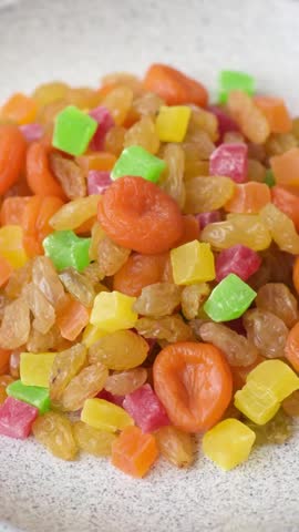 Dried apricots, raisins, and candied fruits as ingredients for baked goods and sweets. Dried fruits