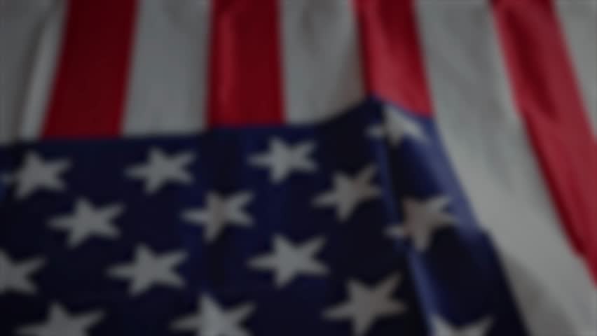 American flag waving with fireworks for the 4th of July. Independence Day, Veterans Day, Memorial Day, Labor Day. Happy Birthday USA.