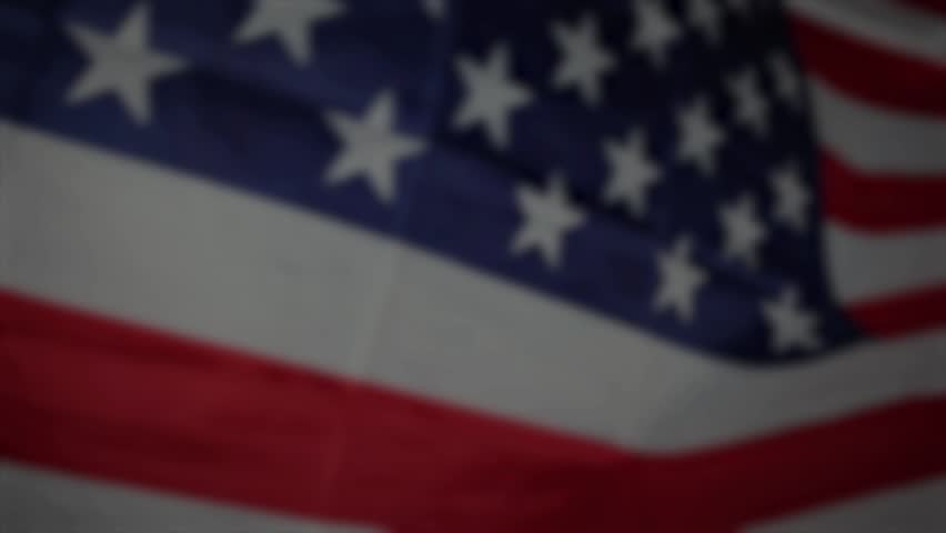American flag waving with fireworks for the 4th of July. Independence Day, Veterans Day, Memorial Day, Labor Day. Happy Birthday USA.