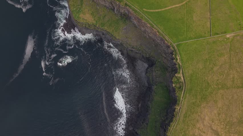 Expansive landscapes of cliff Moher Ireland drone top view