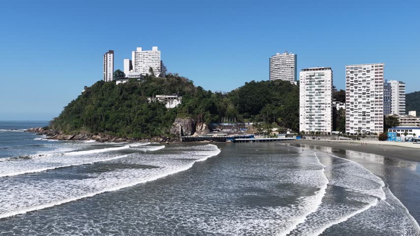 Porchat Island At Sao Vicente In Sao Paulo Brazil. Beach Skyline. Downtown Cityscape. Summer Travel. Porchat Island At Sao Vicente Brazil. Sao Vicente Bay Scenery. Tropical Seascape.