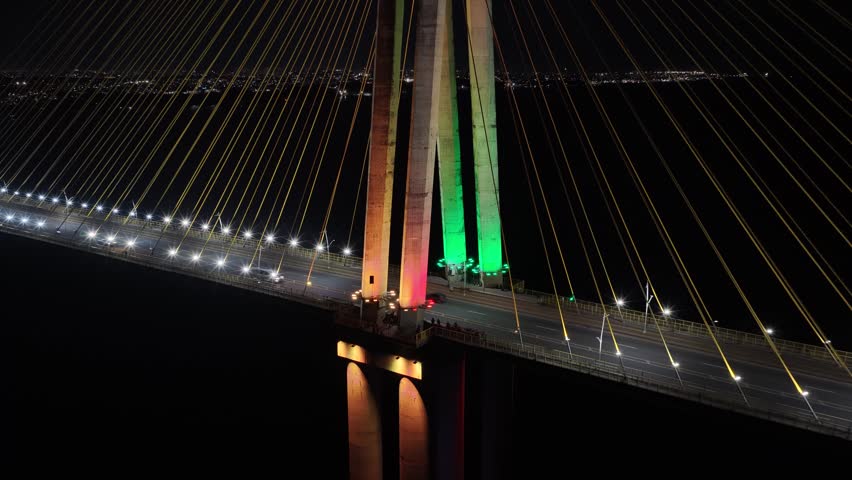 Night Cable Bridge At Manaus In Amazonas Brazil. Illuminated Bridge. Downtown City. Bright Traffic Lights. Cable Bridge In Manaus In Amazonas Brazil. Beautiful Skyline. Illuminated Bridge.