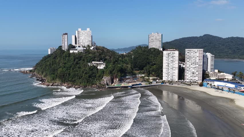 Porchat Island At Sao Vicente In Sao Paulo Brazil. Beach Skyline. Downtown Cityscape. Summer Travel. Porchat Island At Sao Vicente Brazil. Sao Vicente Bay Scenery. Tropical Seascape.
