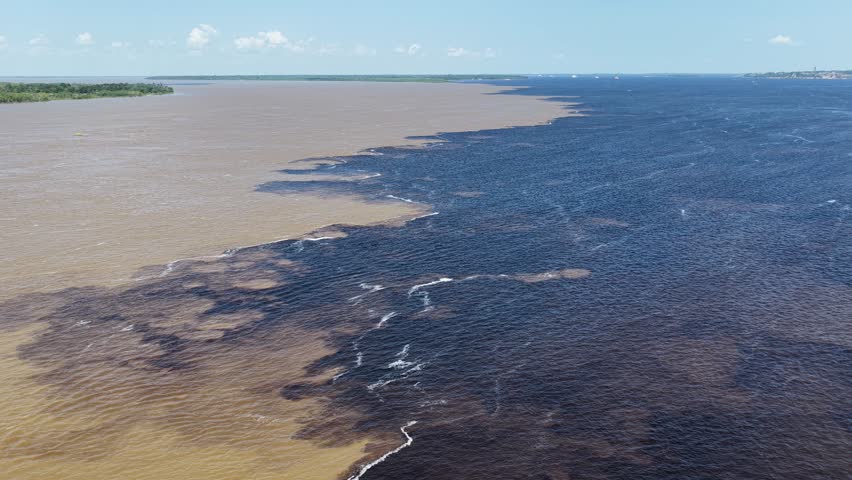 Meeting Of Waters At Manaus In Amazonas Brazil. Water From Black River And Solimoes River Forming The Amazon River. Amazonian Phenomenon. Meeting Of Waters In Manaus In Amazonas Brazil.