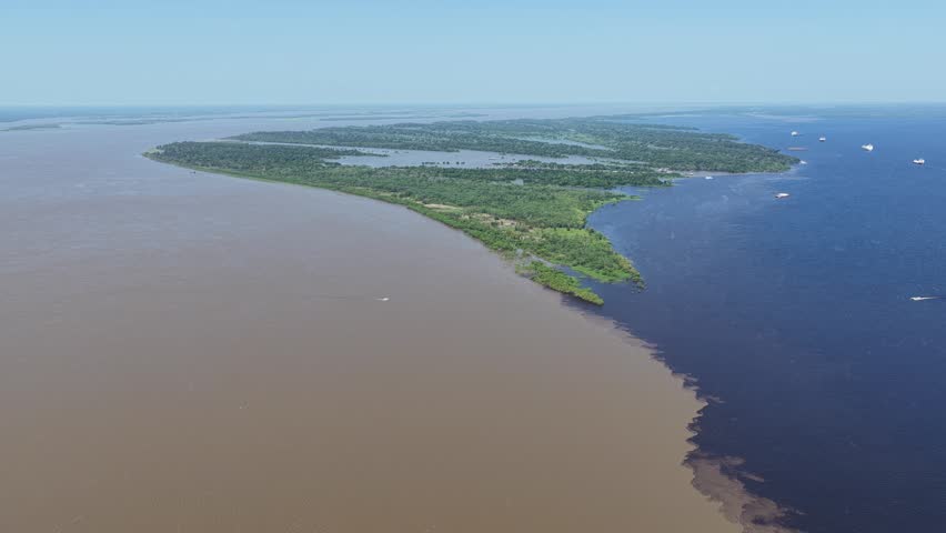 Meeting Of Waters At Manaus In Amazonas Brazil. Water From Black River And Solimoes River Forming The Amazon River. Amazonian Phenomenon. Meeting Of Waters In Manaus In Amazonas Brazil.