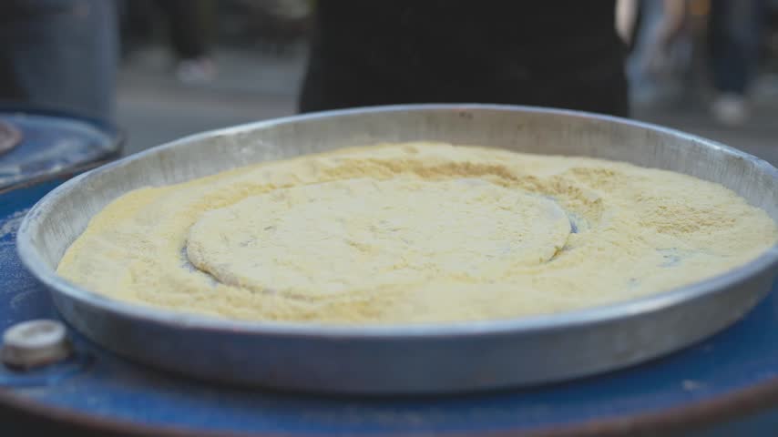 Authentic Italian Margherita pizza served on a rustic outdoor terrace table