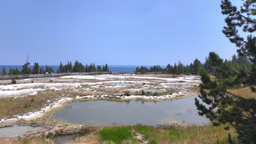 Panoramic view of the West Thumb Geyser Basin at Yellowstone National Park, 4K video
