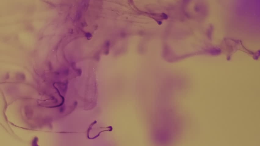 Vertical video. Paint background. Color water. Defocused purple yellow liquid splash fume glitter flow spreading on acrylic creative art abstraction.
