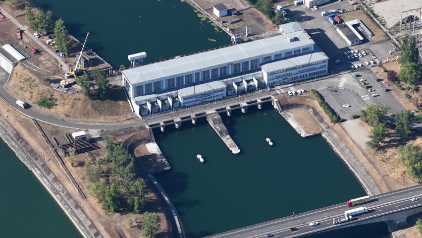 Aerial view of the hydroelectric power plant and lock on the canal in Hombourg, Grand Est, France.