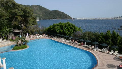 The swimming pool and view on yachts harbor, Marmaris, Turkey