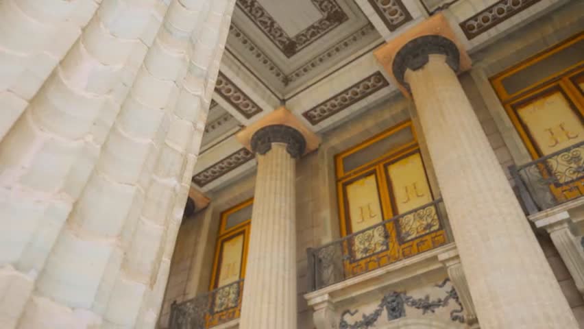 Low angle close up view of the ornate columns and ceiling of Teatro Juarez in Guanajuato Mexico