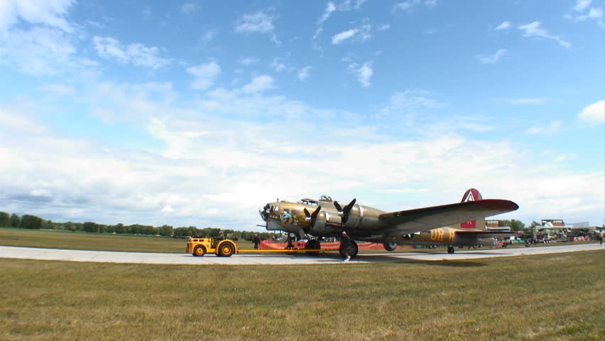 Flying Fortress WWII bomber moving towards the runway.