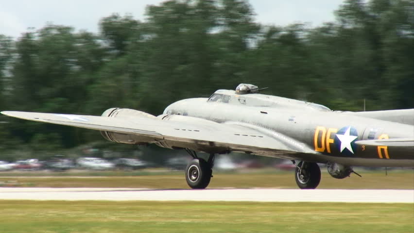 Flying Fortress WWII bomber taking off.