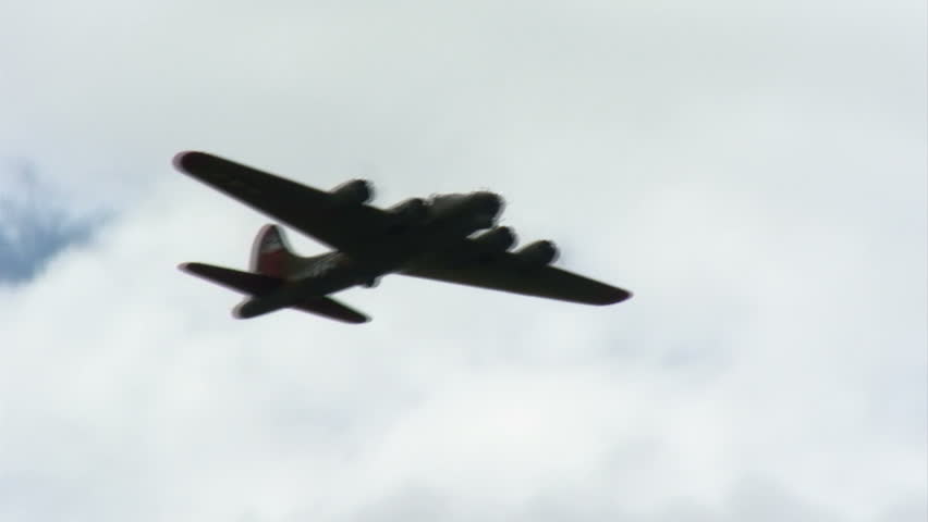 B17 Flying Fortress WWII bomber in flight.