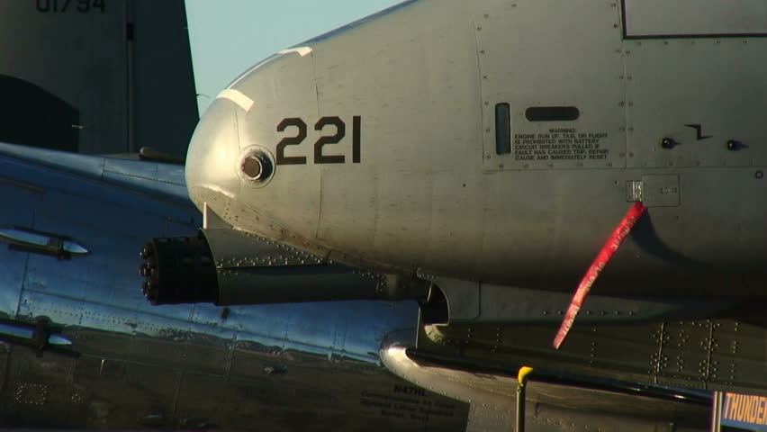Detail of the front of a US Air Force A-10 Thunderbolt fighter plane.
