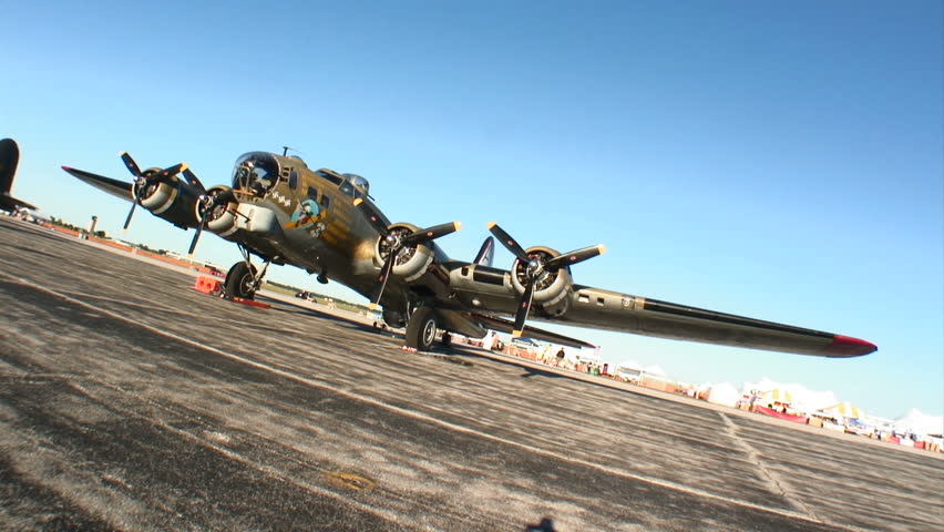 B17 Flying Fortress WWII bomber parked at an airfield.