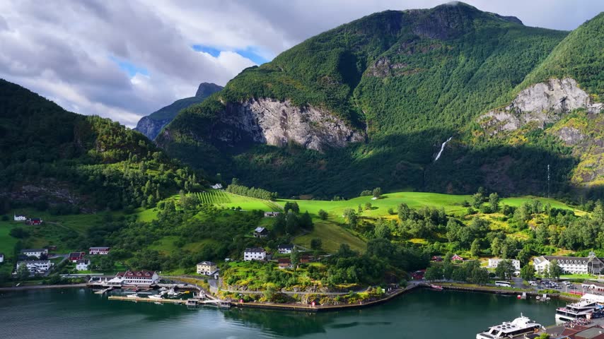 Drone view of Flam village in Norway, beautiful Scandinavian nature, travel in Scandinavia, tourist destination in Norway, famous Flam railway in Norway, Norwegian village near Bergen. High quality 4k footage