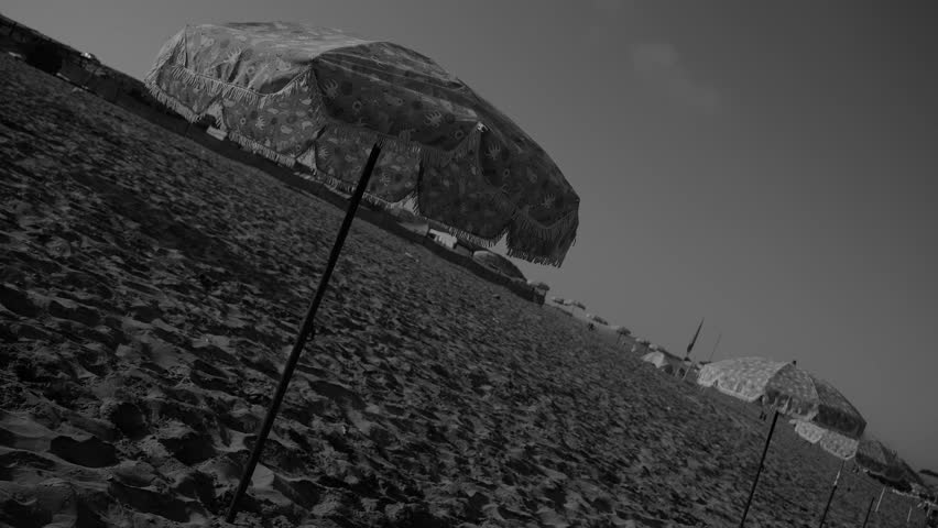 Black and white random 4K sandy beach scenery
