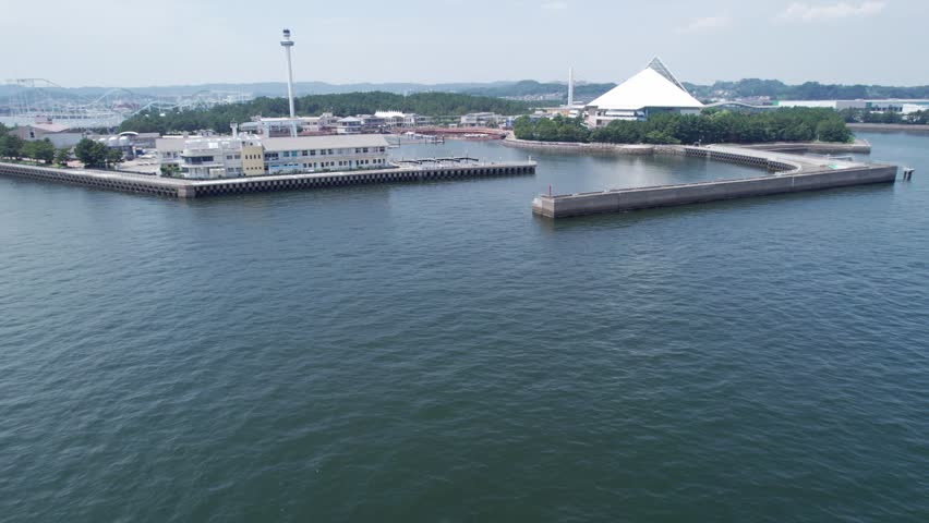 Aerial drone view over Hakkeijima Marina and the waterfront of Yokohama Hakkeijima Sea Paradise in Kanagawa, Japan.