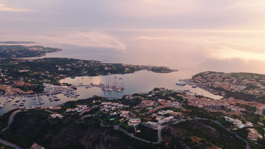 Aerial View Of Porto Cervo Marina And Resort Town At Sunrise In Sardinia, Italy.